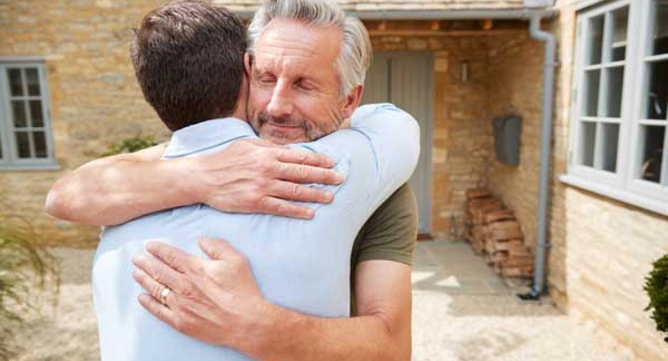 men embracing